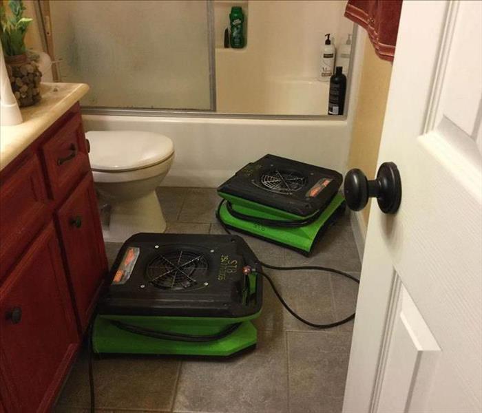 Air movers in bathroom.