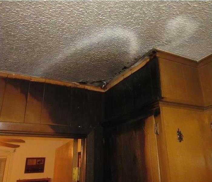 Ceiling of a home damaged by fire